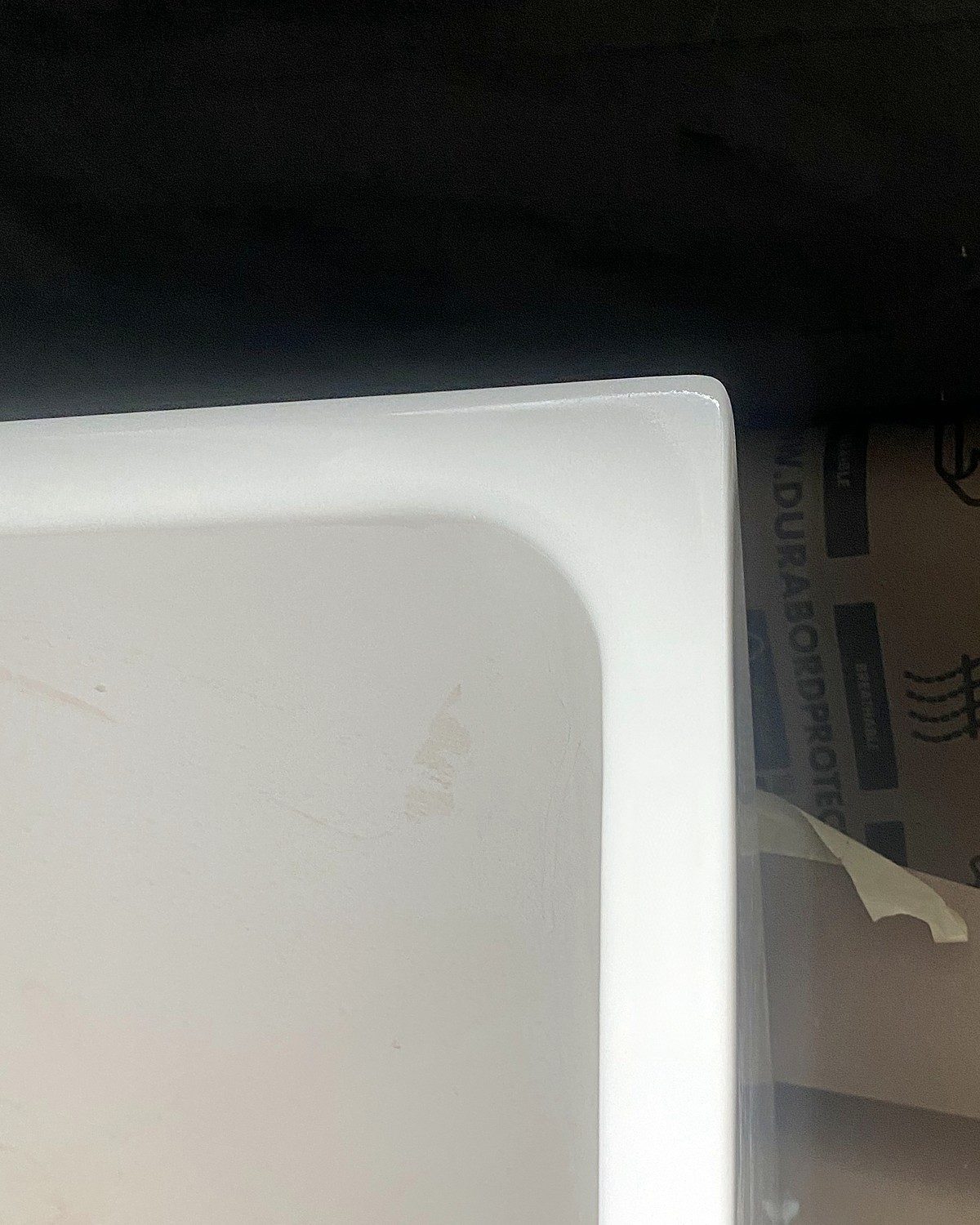 After: chipped bathtub corner repaired